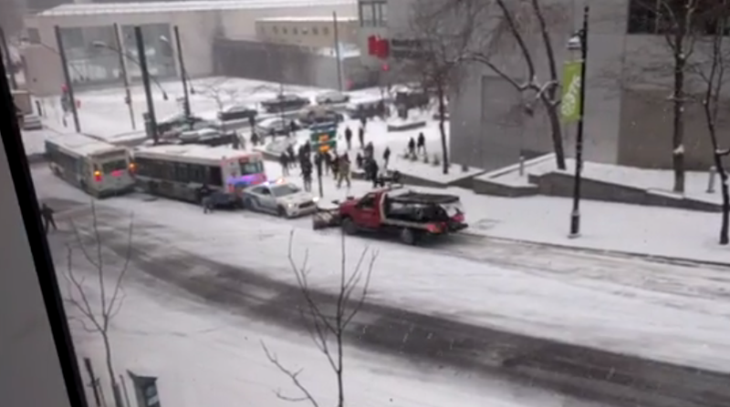 A snow plow careening towards a police cruiser. Photo: Willem Shepherd/Facebook (screengrab)
